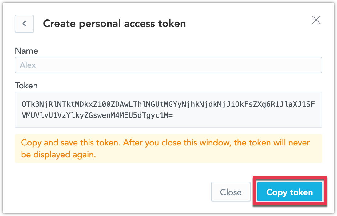 Screenshot of the Create personal access token dialog that displays the newly created API token.